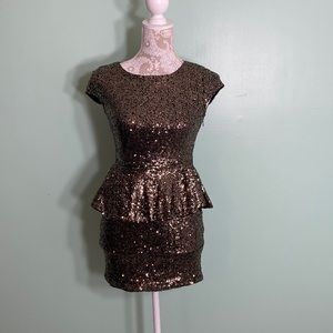 Black and gold peplum mini dress